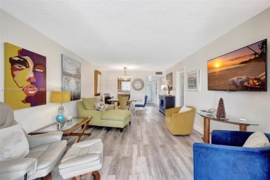 Stunning 1-bedroom, 1.5-bathroom ground-floor unit with a on Sunrise Lakes Phase III in Florida - for sale on GolfHomes.com, golf home, golf lot
