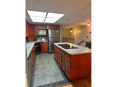 Beautiful 4-bedroom, 3-bathroom townhome in the highly desirable on Baypoint Golf Club in Florida - for sale on GolfHomes.com, golf home, golf lot