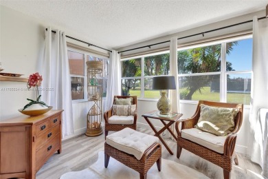 Stunning 1-bedroom, 1.5-bathroom ground-floor unit with a on Sunrise Lakes Phase III in Florida - for sale on GolfHomes.com, golf home, golf lot