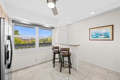 Spacious 2-bedroom, 2-bathroom top-floor condo overlooking a on  in Florida - for sale on GolfHomes.com, golf home, golf lot