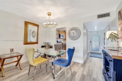 Stunning 1-bedroom, 1.5-bathroom ground-floor unit with a on Sunrise Lakes Phase III in Florida - for sale on GolfHomes.com, golf home, golf lot