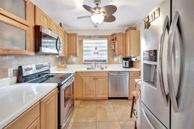 Stunning 1-bedroom, 1.5-bathroom ground-floor unit with a on Sunrise Lakes Phase III in Florida - for sale on GolfHomes.com, golf home, golf lot