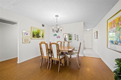 Spacious 2-bedroom, 2-bathroom top-floor condo overlooking a on  in Florida - for sale on GolfHomes.com, golf home, golf lot