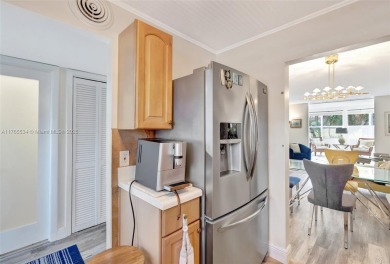 Stunning 1-bedroom, 1.5-bathroom ground-floor unit with a on Sunrise Lakes Phase III in Florida - for sale on GolfHomes.com, golf home, golf lot