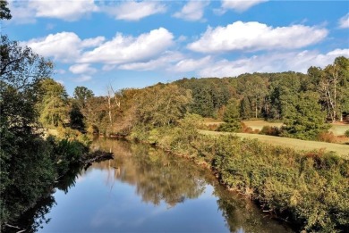 Spectacular .73-acre lush wooded lot, secluded on a private on Achasta Golf Club in Georgia - for sale on GolfHomes.com, golf home, golf lot