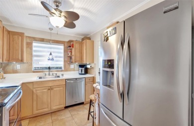 Stunning 1-bedroom, 1.5-bathroom ground-floor unit with a on Sunrise Lakes Phase III in Florida - for sale on GolfHomes.com, golf home, golf lot