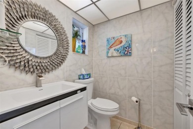 Stunning 1-bedroom, 1.5-bathroom ground-floor unit with a on Sunrise Lakes Phase III in Florida - for sale on GolfHomes.com, golf home, golf lot
