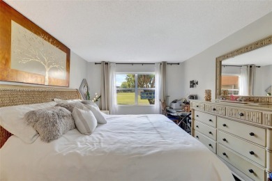 Stunning 1-bedroom, 1.5-bathroom ground-floor unit with a on Sunrise Lakes Phase III in Florida - for sale on GolfHomes.com, golf home, golf lot