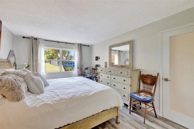 Stunning 1-bedroom, 1.5-bathroom ground-floor unit with a on Sunrise Lakes Phase III in Florida - for sale on GolfHomes.com, golf home, golf lot