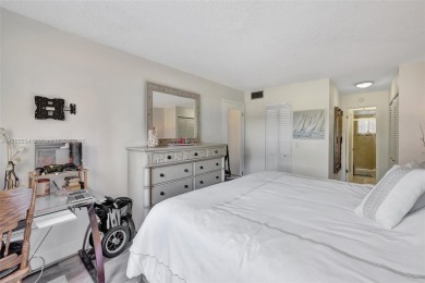 Stunning 1-bedroom, 1.5-bathroom ground-floor unit with a on Sunrise Lakes Phase III in Florida - for sale on GolfHomes.com, golf home, golf lot