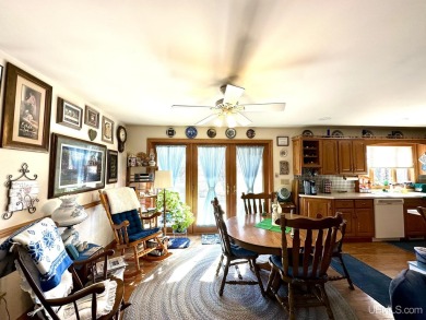 Step into a realm of timeless charm with this beautiful on Escanaba Country Club in Michigan - for sale on GolfHomes.com, golf home, golf lot