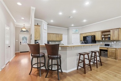 Welcome home to this sunny and spacious three-bedroom plus on Whitestone Golf Club in Texas - for sale on GolfHomes.com, golf home, golf lot
