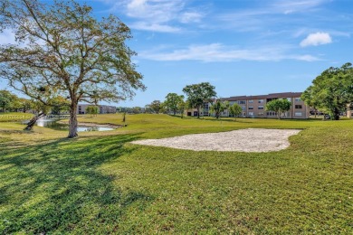 Stunning 1-bedroom, 1.5-bathroom ground-floor unit with a on Sunrise Lakes Phase III in Florida - for sale on GolfHomes.com, golf home, golf lot