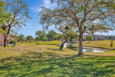 Stunning 1-bedroom, 1.5-bathroom ground-floor unit with a on Sunrise Lakes Phase III in Florida - for sale on GolfHomes.com, golf home, golf lot