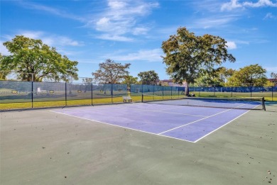 Stunning 1-bedroom, 1.5-bathroom ground-floor unit with a on Sunrise Lakes Phase III in Florida - for sale on GolfHomes.com, golf home, golf lot