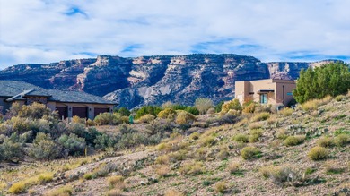 Situated within the prestigious Redlands Mesa golf community on The Golf Club At Redlands Mesa in Colorado - for sale on GolfHomes.com, golf home, golf lot