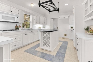 Welcome to 532 Dogwood Lane in the gated Hideaway Lake on Hide-A-Way Lake Golf Course in Texas - for sale on GolfHomes.com, golf home, golf lot