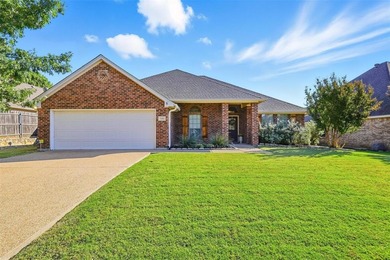 Welcome home to this sunny and spacious three-bedroom plus on Whitestone Golf Club in Texas - for sale on GolfHomes.com, golf home, golf lot