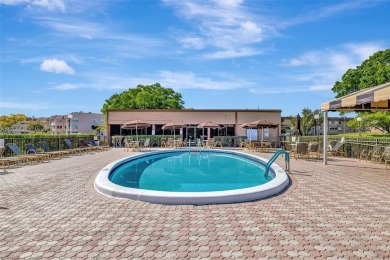 Stunning 1-bedroom, 1.5-bathroom ground-floor unit with a on Sunrise Lakes Phase III in Florida - for sale on GolfHomes.com, golf home, golf lot