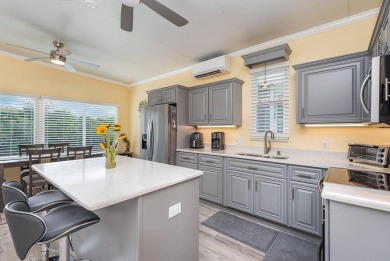 This fully renovated Executive Suite is 996 sq.ft. of a/c'd on The Great Outdoors Golf and Country Club in Florida - for sale on GolfHomes.com, golf home, golf lot