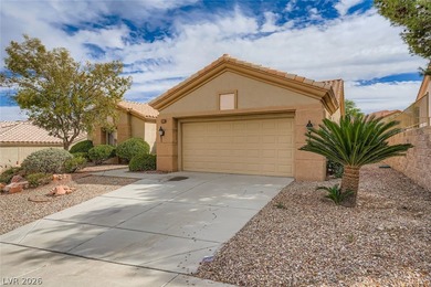 Charming Minden Model in Sun City Summerlin! This clean on Highland Falls Golf Club in Nevada - for sale on GolfHomes.com, golf home, golf lot