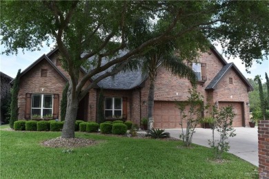 Experience serene pond-side living in this expertly crafted home on Harlingen Country Club in Texas - for sale on GolfHomes.com, golf home, golf lot