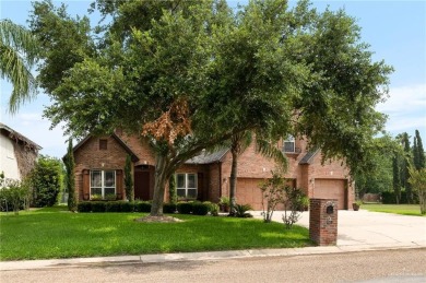 Experience serene pond-side living in this expertly crafted home on Harlingen Country Club in Texas - for sale on GolfHomes.com, golf home, golf lot