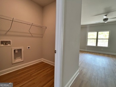 The Ellington Plan built by Stephen Elliott Homes. Quick on Chimney Oaks Golf Club in Georgia - for sale on GolfHomes.com, golf home, golf lot