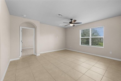 Welcome to this beautifully maintained 4-bedroom, 2-bathroom on Deep Creek Golf Club in Florida - for sale on GolfHomes.com, golf home, golf lot