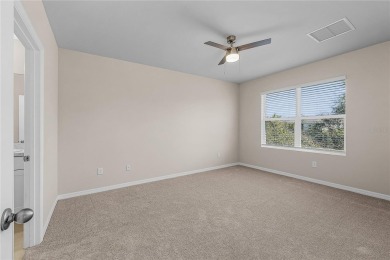 Welcome to this beautifully maintained 4-bedroom, 2-bathroom on Deep Creek Golf Club in Florida - for sale on GolfHomes.com, golf home, golf lot