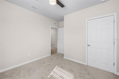 Welcome to this beautifully maintained 4-bedroom, 2-bathroom on Deep Creek Golf Club in Florida - for sale on GolfHomes.com, golf home, golf lot