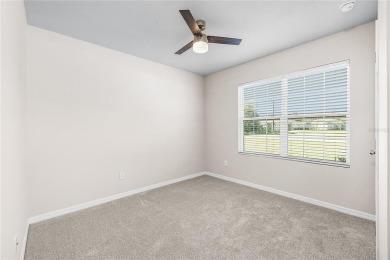 Welcome to this beautifully maintained 4-bedroom, 2-bathroom on Deep Creek Golf Club in Florida - for sale on GolfHomes.com, golf home, golf lot