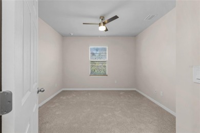 Welcome to this beautifully maintained 4-bedroom, 2-bathroom on Deep Creek Golf Club in Florida - for sale on GolfHomes.com, golf home, golf lot