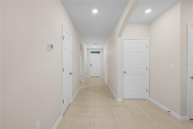 Welcome to this beautifully maintained 4-bedroom, 2-bathroom on Deep Creek Golf Club in Florida - for sale on GolfHomes.com, golf home, golf lot