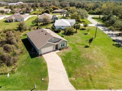 Welcome to this beautifully maintained 4-bedroom, 2-bathroom on Deep Creek Golf Club in Florida - for sale on GolfHomes.com, golf home, golf lot