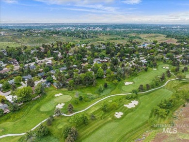 Discover luxury living in this stunning 6-bed, 4-bath home on Crane Creek Country Club in Idaho - for sale on GolfHomes.com, golf home, golf lot