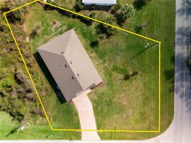 Welcome to this beautifully maintained 4-bedroom, 2-bathroom on Deep Creek Golf Club in Florida - for sale on GolfHomes.com, golf home, golf lot