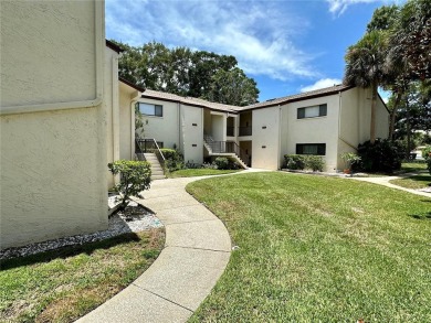 Spacious 3 bedroom, 2 bath split plan condo in a desirable on East Bay Golf Club in Florida - for sale on GolfHomes.com, golf home, golf lot