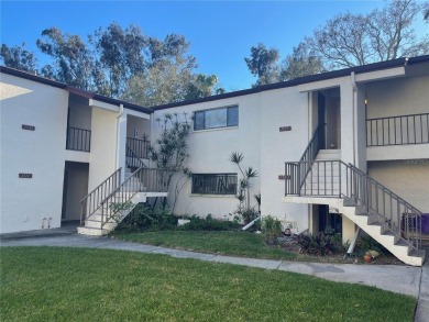 Spacious 3 bedroom, 2 bath split plan condo in a desirable on East Bay Golf Club in Florida - for sale on GolfHomes.com, golf home, golf lot