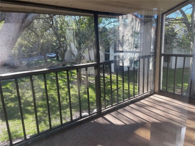 Spacious 3 bedroom, 2 bath split plan condo in a desirable on East Bay Golf Club in Florida - for sale on GolfHomes.com, golf home, golf lot