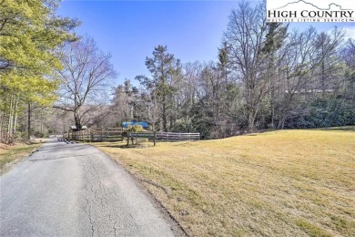 A wooded lot on a quiet street with utilities available on Land Harbor Golf Course in North Carolina - for sale on GolfHomes.com, golf home, golf lot