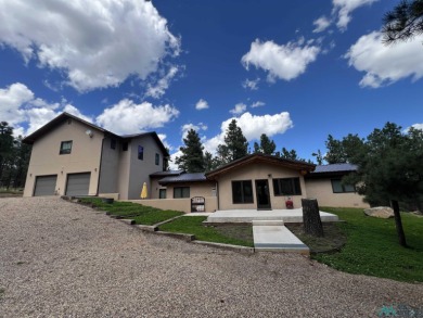 Wake up to fresh mountain air, peaceful pines, and the beauty of on Pendaries Village Community Assoc. in New Mexico - for sale on GolfHomes.com, golf home, golf lot