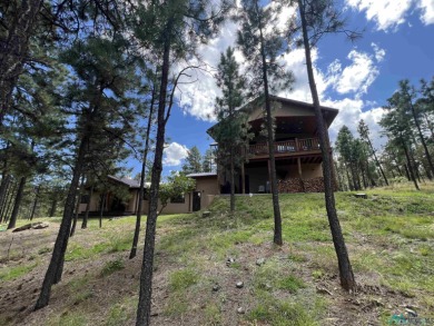 Wake up to fresh mountain air, peaceful pines, and the beauty of on Pendaries Village Community Assoc. in New Mexico - for sale on GolfHomes.com, golf home, golf lot