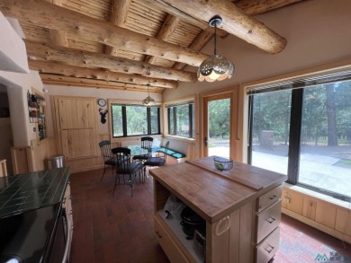 Wake up to fresh mountain air, peaceful pines, and the beauty of on Pendaries Village Community Assoc. in New Mexico - for sale on GolfHomes.com, golf home, golf lot