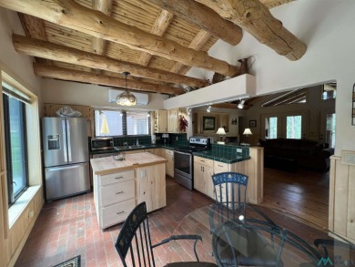 Wake up to fresh mountain air, peaceful pines, and the beauty of on Pendaries Village Community Assoc. in New Mexico - for sale on GolfHomes.com, golf home, golf lot