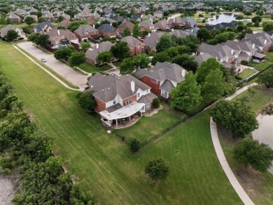 Amazing waterfront home in the exclusive gated community of on Heritage Lakes - Par 3 - 9 Hole Course in Texas - for sale on GolfHomes.com, golf home, golf lot