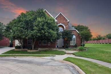 Amazing waterfront home in the exclusive gated community of on Heritage Lakes - Par 3 - 9 Hole Course in Texas - for sale on GolfHomes.com, golf home, golf lot