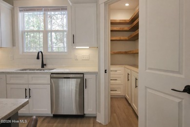 Over 3,000 sqft of refined living in a gated golf community on Woodlake Country Club in North Carolina - for sale on GolfHomes.com, golf home, golf lot