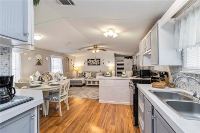 Step into a world of sun-drenched sophistication and carefree on Twin Isles Country Club in Florida - for sale on GolfHomes.com, golf home, golf lot