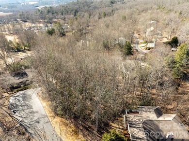 Discover the opportunity to build your mountain retreat in on Cummings Cove Golf and Country Club in North Carolina - for sale on GolfHomes.com, golf home, golf lot